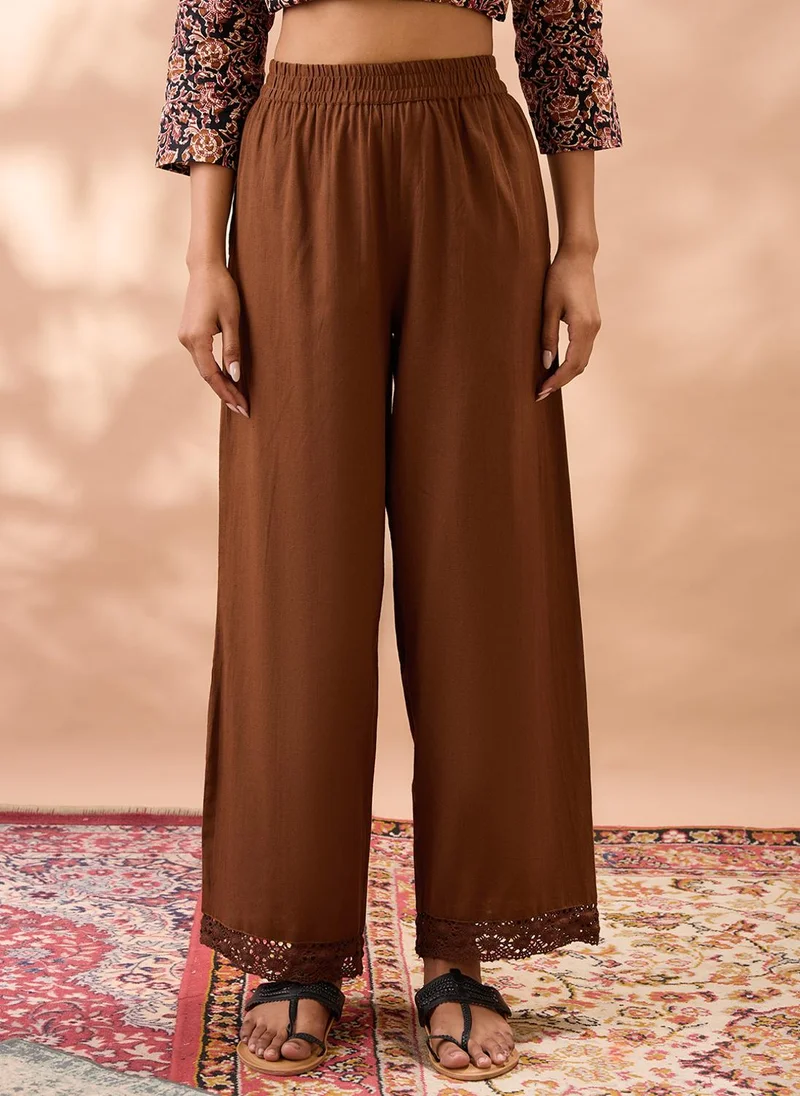 globus  Globus Women Brown Solid High Rise Lace Detail Hem Straight Fit Wide Leg Ethnic Pants for Women | Best Price UAE